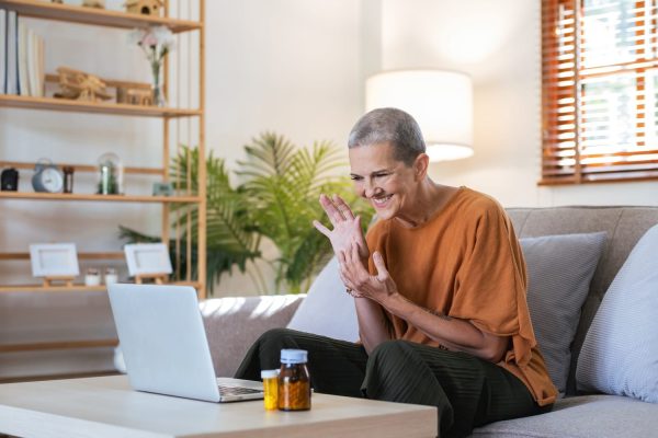 Asian senior video call with doctor telemedicine telehealth concept
